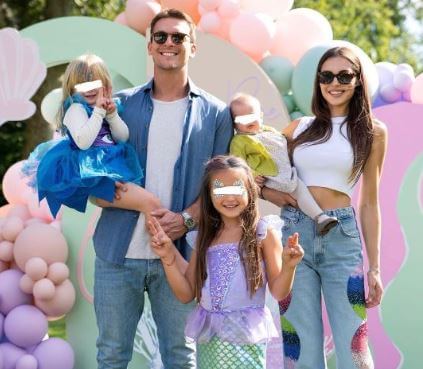 Anja Valente with her husband and children.